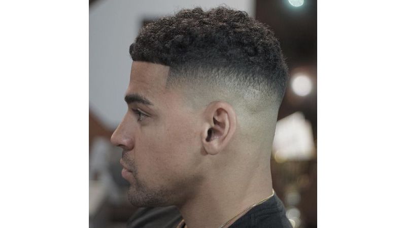 estilos de corte masculino cabelo cacheado curto
