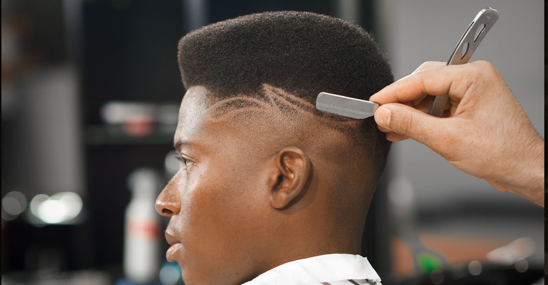 desenho na lateral do cabelo masculino