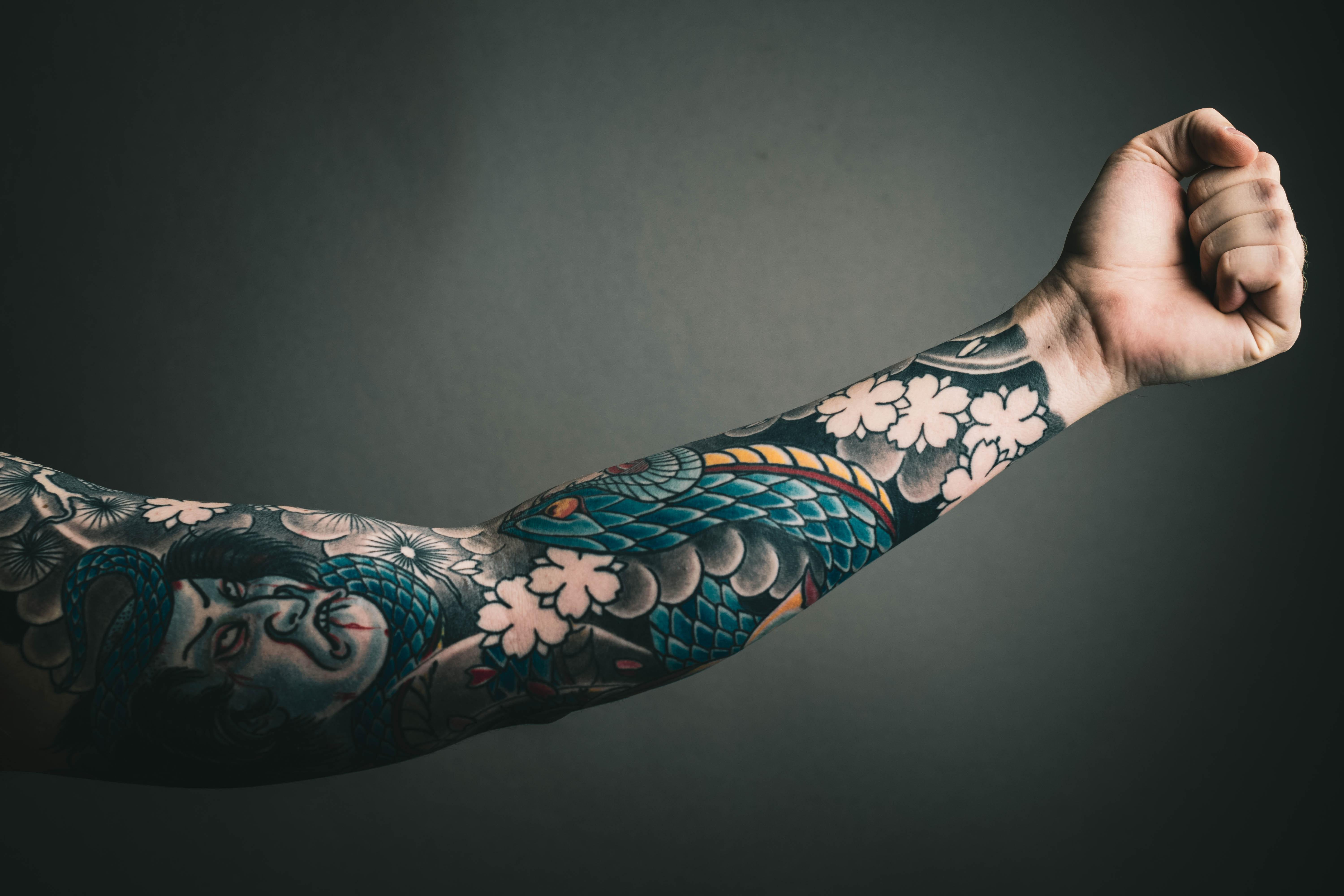 melhores estilos de tatuagem masculina braço 2026