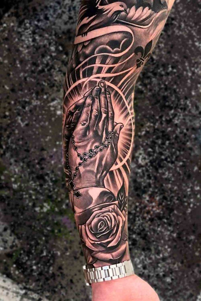 tatuagem braço fechado jesus cristo