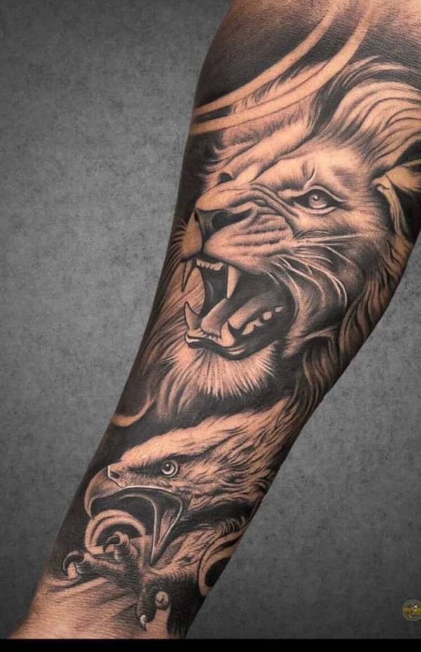 tatuagem de leão para cobrir nome no braço
